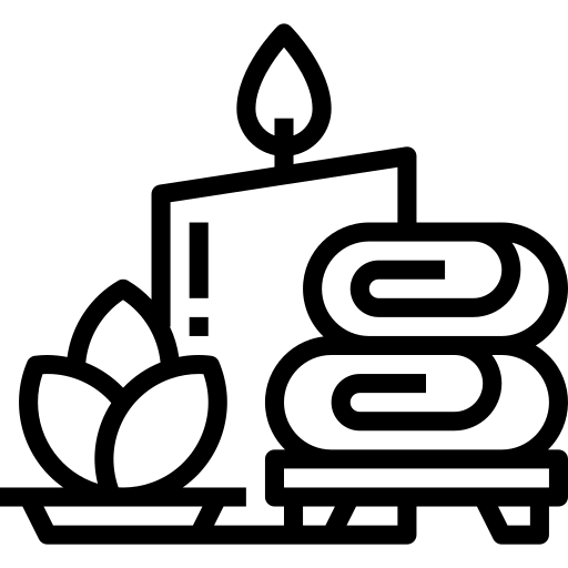 Spa-Symbol mit brennender Kerze und Handtuch für Entspannung und Wellness